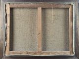 an old window frame with a burlocked glass window and burlocked glass