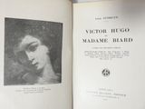 an open book with a picture of a woman ' s face on it