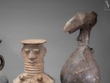 three vases are sitting next to each other on a table