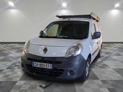 a picture of a small white van parked in a garage