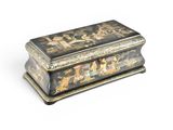 a black and gold box with a painting on it