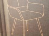 a cardboard box with a drawing of a chair on it