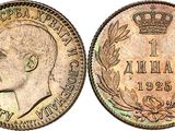 a close up of a coin with a crown on top of it