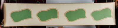quatre touches de peinture verte sur une feuille de papier blanc