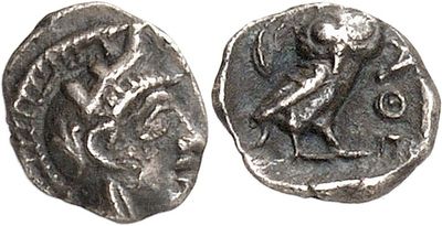 a silver coin with an image of a man on it