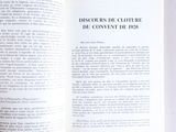 an open book with a picture of a clock on it