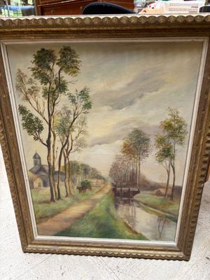 Tableau à l'huile encadré représentant une scène champêtre avec une rivière et un pont