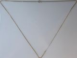 a necklace with a gold chain and a gold pendant on a white background
