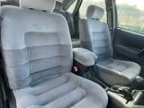 two seats in the back of a car that are empty