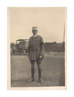 an old black and white photo of a man in a military uniform