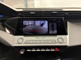 a close up of a car dashboard with a camera mounted on the dash