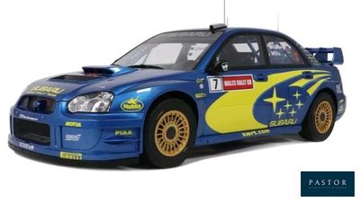 the car is blue and yellow with a yellow star on the side