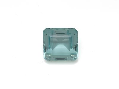 an aqua blue topazte gems on a white background
