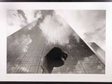 a black and white photo of a tall building