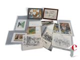 une photo montrant un ensemble de dessins et d'images posés sur une table