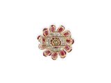 a close up of a gold and red broochle on a white background