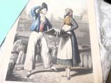 une photo d'un homme et d'une femme debout l'un à côté de l'autre