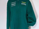 a close up of a green sweatshirt on a mannequin mannequin