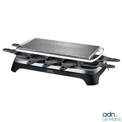 an image of a black and silver grill with a griddle