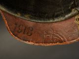 a close up of a hat with a tag on it