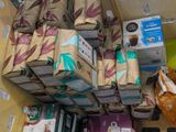 many boxes of coffee sitting on top of each other