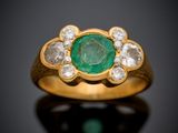 an emerald and diamond ring