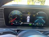the dashboard of a car with a digital display on it