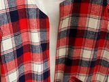 a close up of a red and blue plaid shirt on a mannequin mannequin mannequin mannequin mannequin mannequin manne