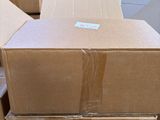 several boxes are stacked on top of each other in a warehouse