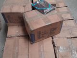 boxes stacked on top of each other in a warehouse