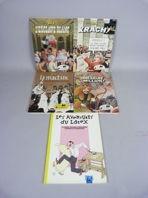 trois livres posés sur une table blanche recouverte d'une nappe blanche