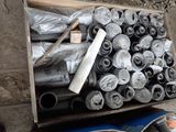 a box full of pipes and pipes on the ground