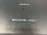 a close up of a laptop with a battery on it