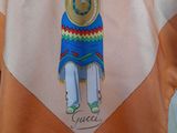 a scarf with a picture of a man on it