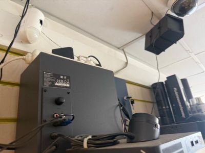 an image of a room with a lot of electronics on the wall