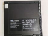 a black laptop with a battery on top of it