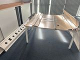 a table that has a bench on it in a room