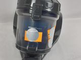 a close up of a vacuum cleaner on a white surface