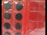 a picture of a close up of a red case with coins