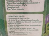 a label on the back of a bottle of liquid