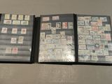 several different types of stamps are on display in a display case