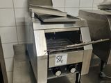 two machines that are sitting on a counter in a kitchen