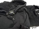 a pile of clothing that is laying on the ground
