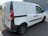a white van that is parked in a parking lot