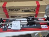 a box of skis and a pair of skis on a table