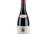 bottle of red wine on a white background with a red cap