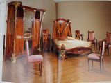 an open book with a picture of a bedroom in it