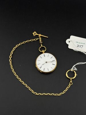 a close up of a pocket watch on a chain with a price tag