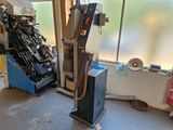 a machine that is sitting in the corner of a room