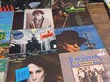 a lot of music books on the table